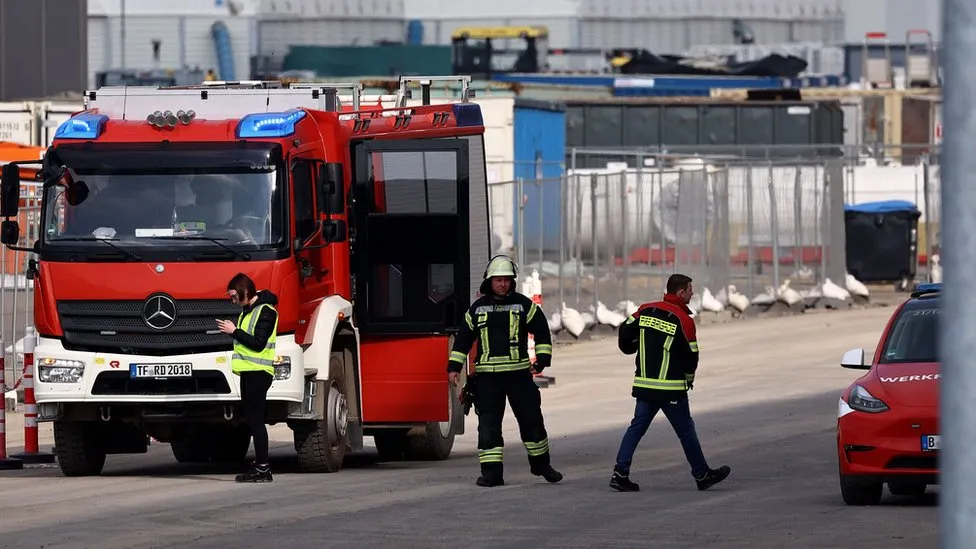 Halt at Tesla: Production pauses due to suspected arson